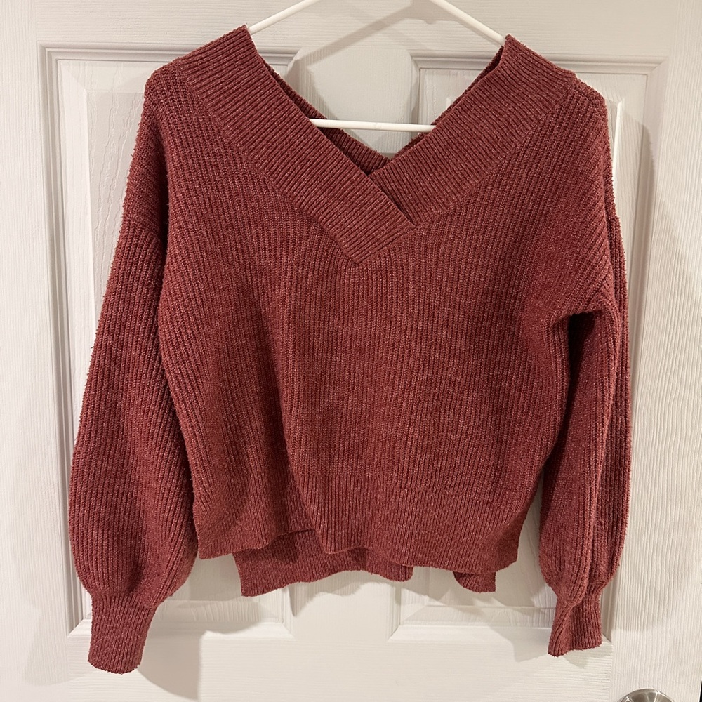V neck sweater.